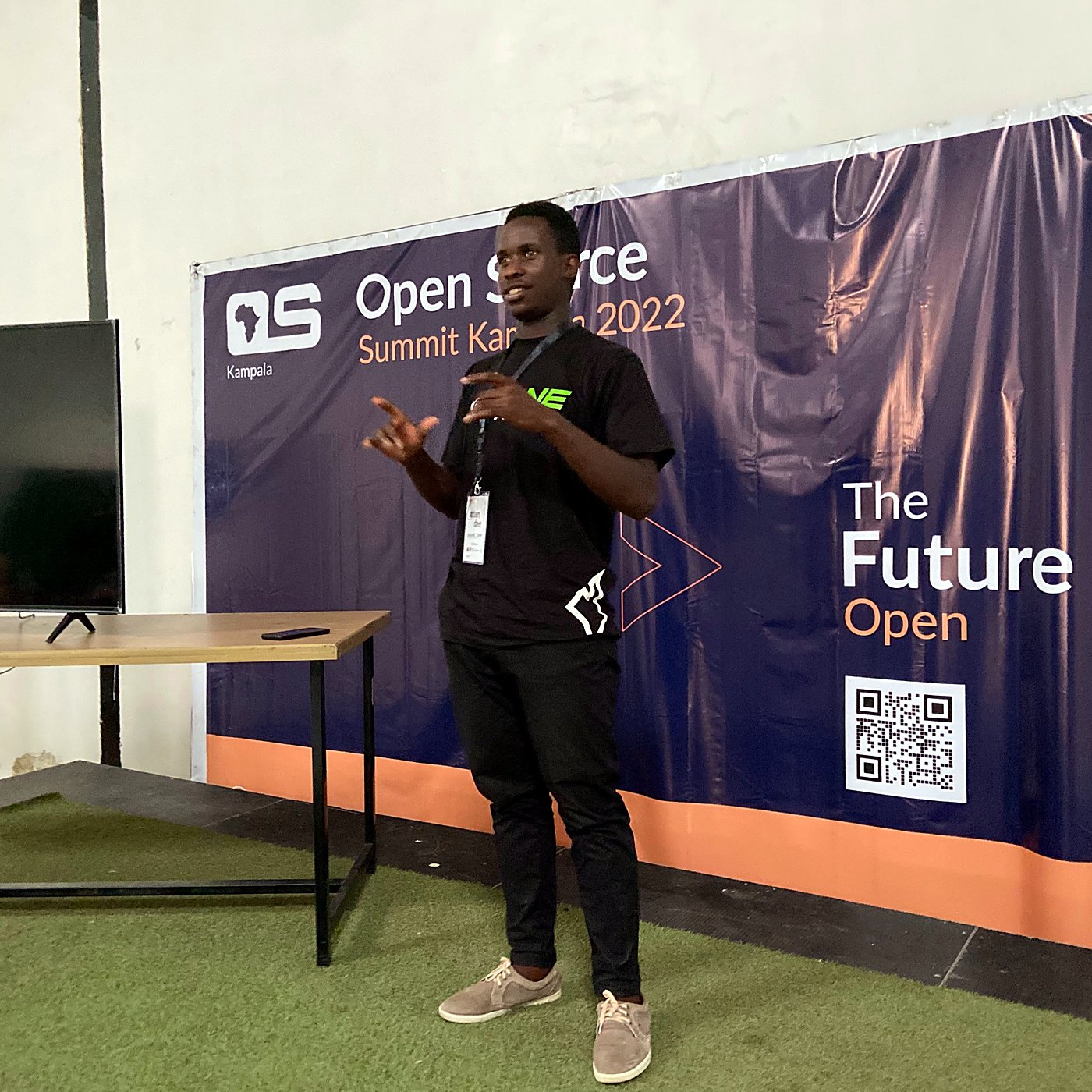 Joshua Kakembo speaking at Open Source Summit Kampala 2022